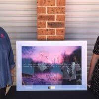 Allira House director Sallyann Price (left) and NNSW Conference women's ministries director Pastor Bethany Chapman unveiling the plaque.